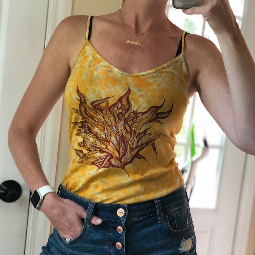 Yellow tie dye tank top with artist drawing